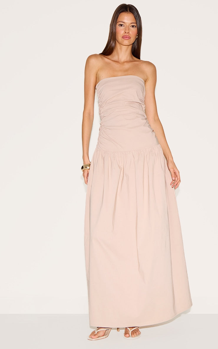https://cdn-img.prettylittlething.com/1/5/c/7/15c7e0874867425a186304b90388be6f92519982_CNN3718_1_sand_stretch_woven_bandeau_ruched_maxi_dress.jpg