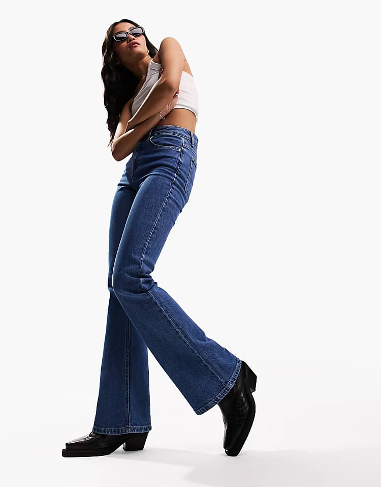 https://images.asos-media.com/products/asos-design-mid-rise-flare-jeans-in-mid-blue/204265302-4?$n_750w$&wid=750&fit=constrain