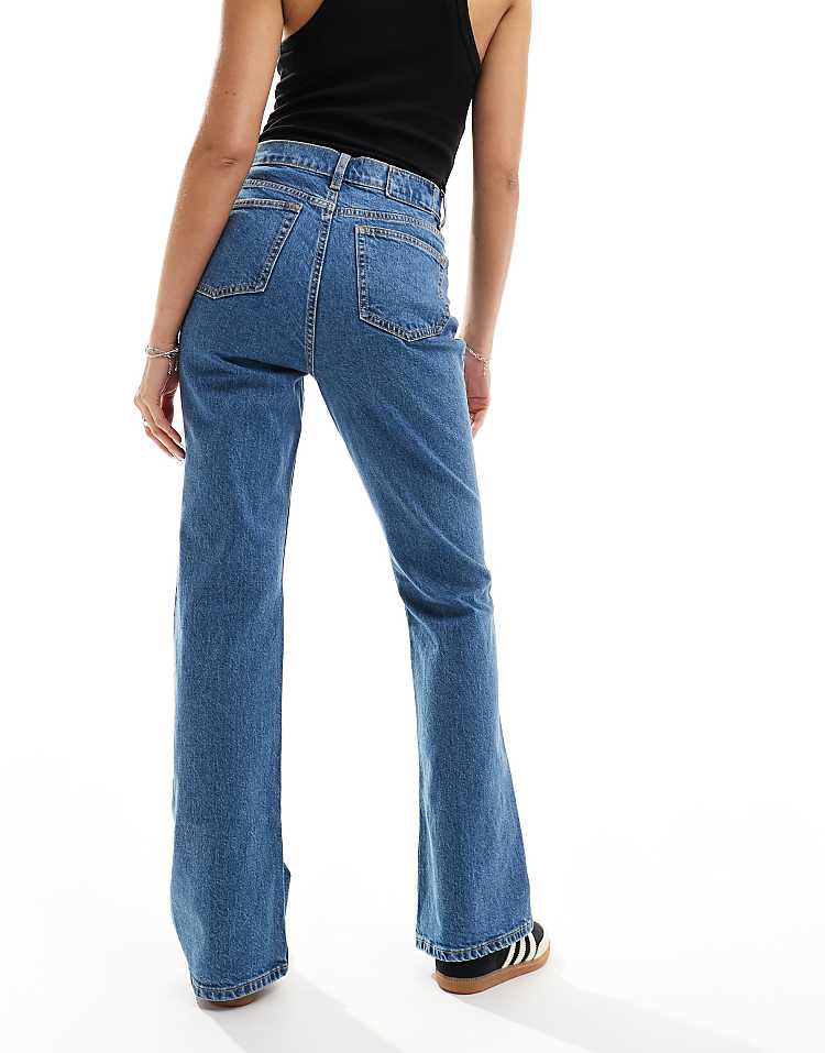 https://images.asos-media.com/products/asos-design-mid-rise-flare-jeans-in-mid-blue/205470651-2?$n_750w$&wid=750&fit=constrain