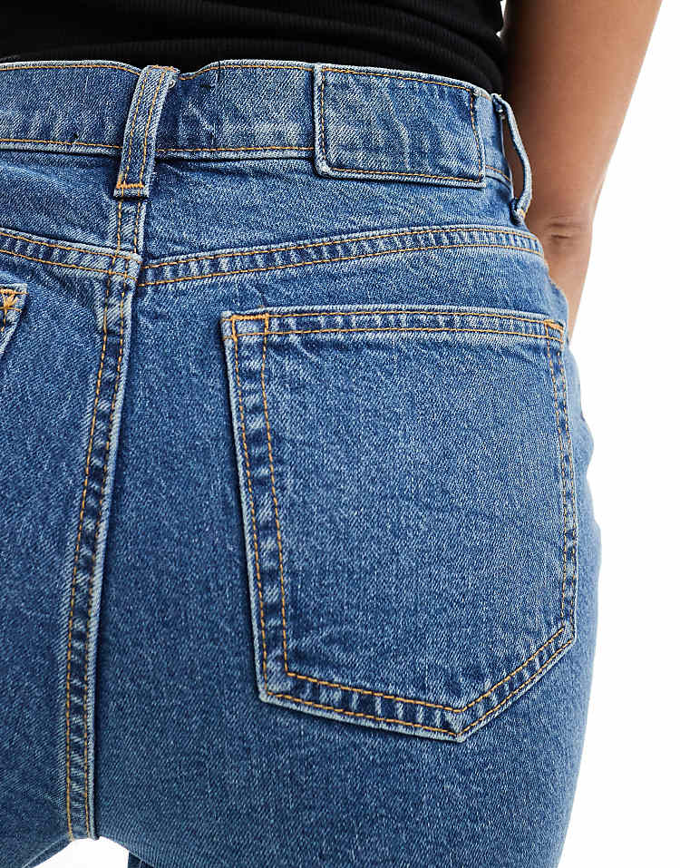 https://images.asos-media.com/products/asos-design-mid-rise-flare-jeans-in-mid-blue/205470651-3?$n_750w$&wid=750&fit=constrain