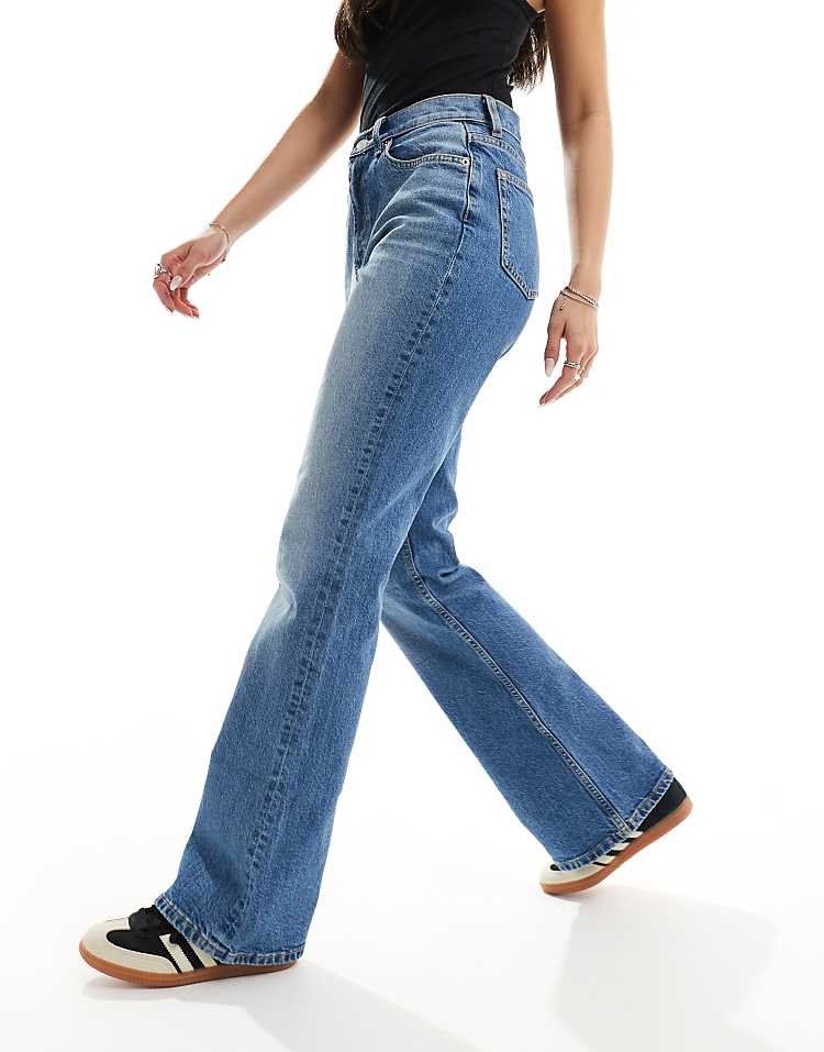 https://images.asos-media.com/products/asos-design-mid-rise-flare-jeans-in-mid-blue/205470651-4?$n_750w$&wid=750&fit=constrain