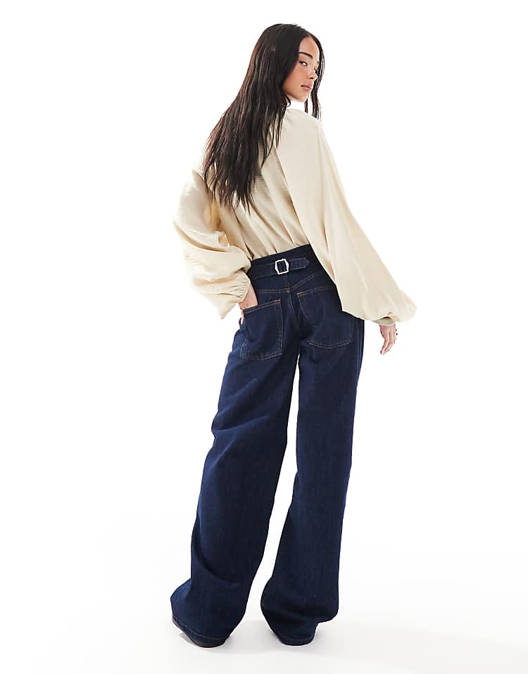 https://images.asos-media.com/products/topshop-cinch-low-rise-relaxed-jean-in-raw-indigo/205897926-2?$n_750w$&wid=750&fit=constrain