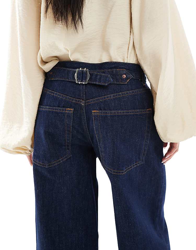 https://images.asos-media.com/products/topshop-cinch-low-rise-relaxed-jean-in-raw-indigo/205897926-4?$n_750w$&wid=750&fit=constrain