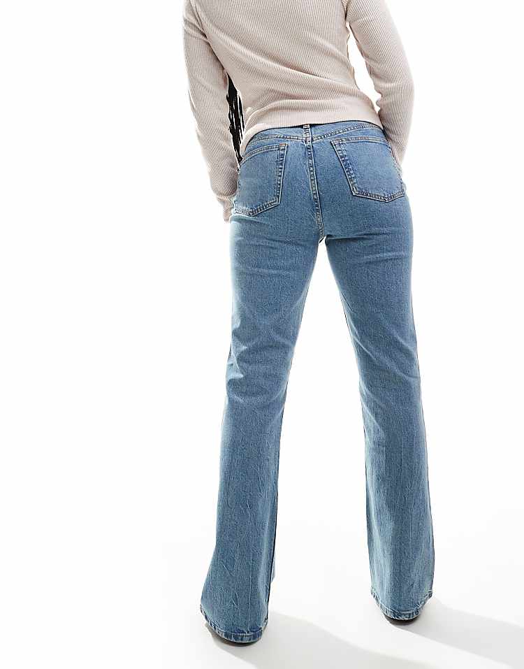 https://images.asos-media.com/products/asos-design-mid-rise-flare-jeans-in-light-vintage-wash/206427996-5?$n_750w$&wid=750&fit=constrain
