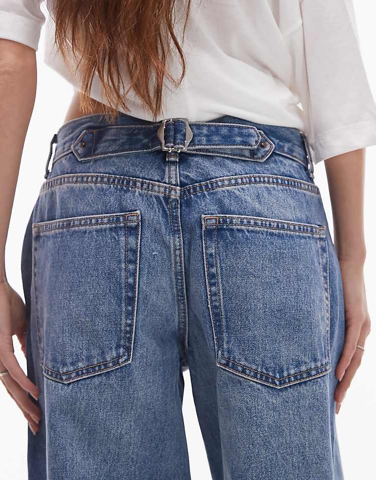 https://images.asos-media.com/products/topshop-cinch-low-rise-relaxed-fit-jean-in-mid-blue/207295894-4?$n_750w$&wid=750&fit=constrain