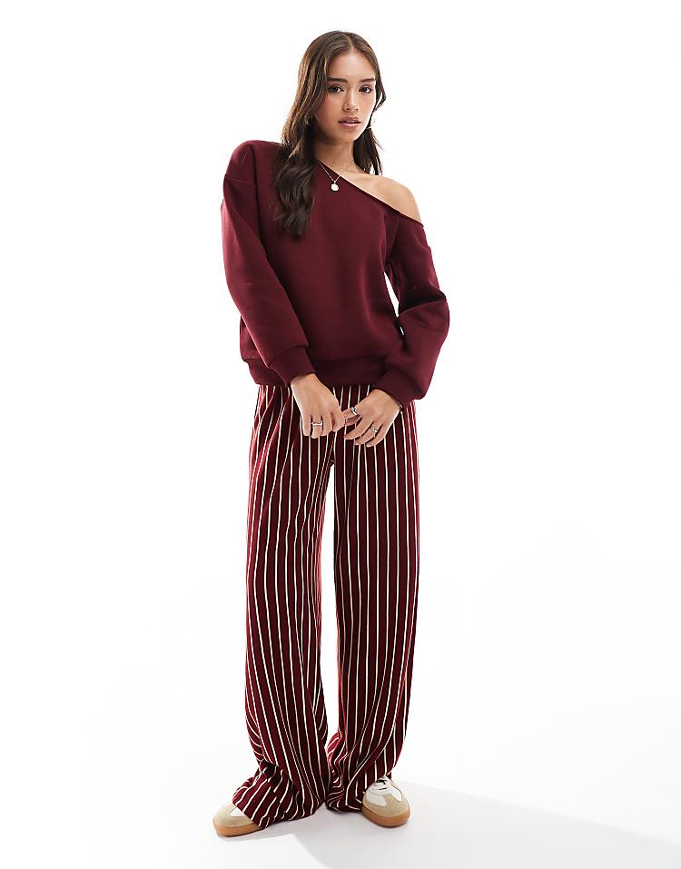 ASOS DESIGN asymmetric slouchy sweatshirt in burgundy