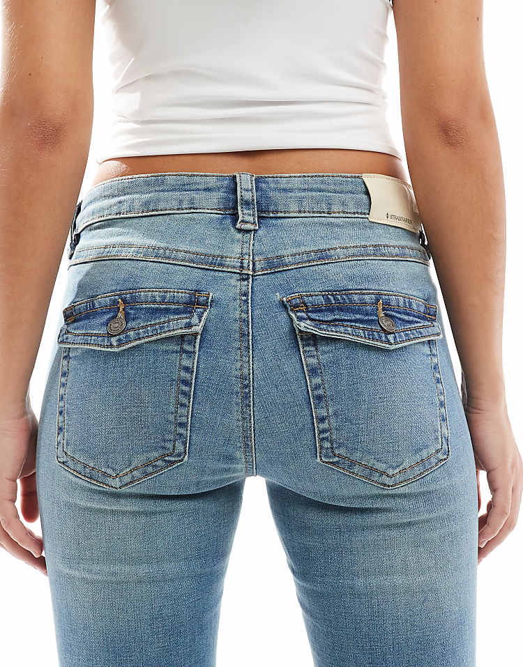 https://images.asos-media.com/products/stradivarius-low-rise-flare-jean-in-mid-blue/207743057-4?$n_750w$&wid=750&fit=constrain