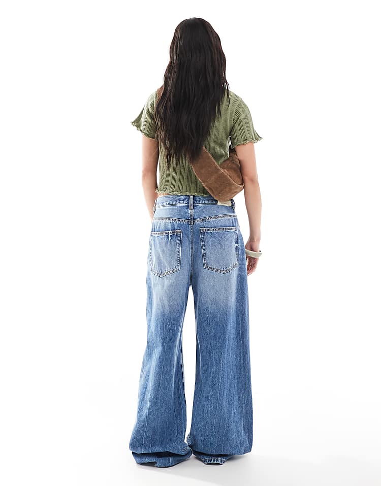 https://images.asos-media.com/products/stradivarius-d88-low-rise-baggy-jean-in-dark-wash/207954547-2?$n_750w$&wid=750&fit=constrain