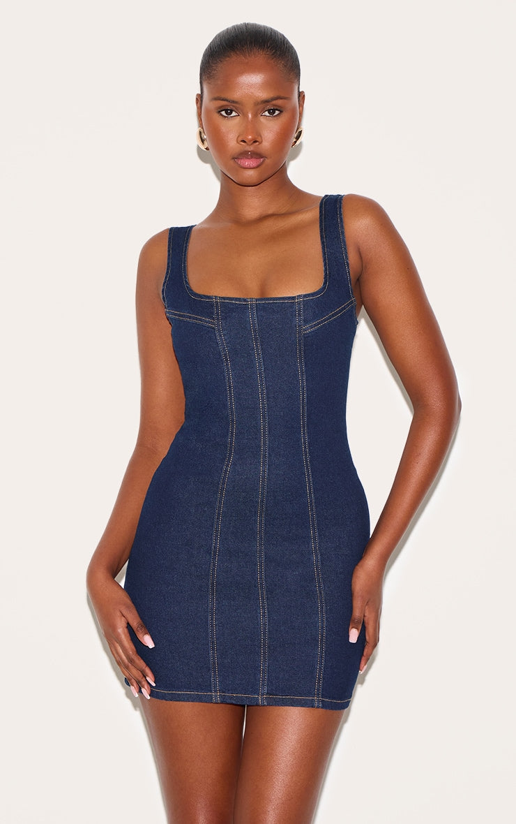 https://cdn-img.prettylittlething.com/2/6/7/8/26784615509a990188b7b14320cb10306f60fb4e_CNL1238_1_indigo_seam_detail_mini_dress.jpg