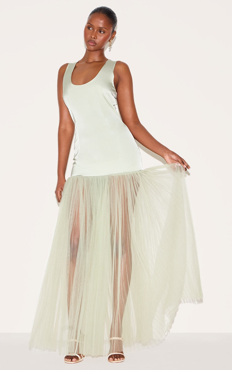 https://cdn-img.prettylittlething.com/2/c/5/3/2c53b3f1e53fa300b4bfebc1c34abd6f6720205c_CNM0558_3_sage_green_scoop_neck_drop_waist_maxi_dress.jpg