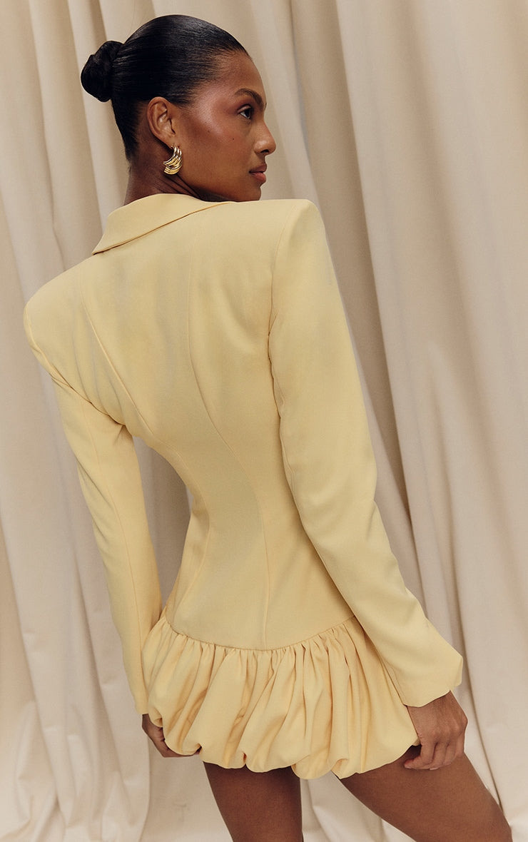 https://cdn-img.prettylittlething.com/6/9/a/b/69ab1298834ee655f18e0f881d80d41e31c356b3_CNL8433_2_lemon_plunge_puff_hem_blazer_dress.jpg