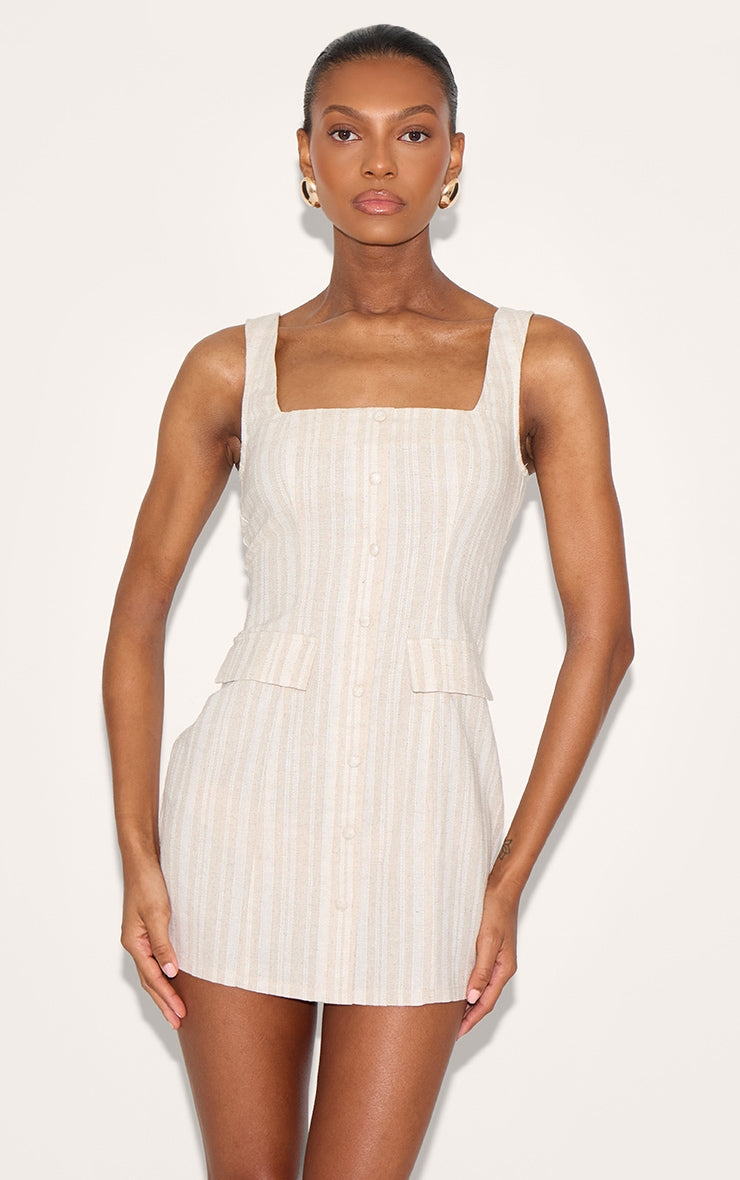 https://cdn-img.prettylittlething.com/8/7/0/7/8707afccdbb8833bd4b7cff981071dac6fa51ca3_CNM1540_1_stone_striped_pocket_detail_dress.jpg