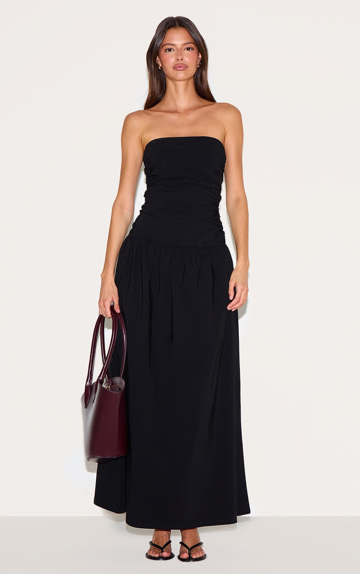 https://cdn-img.prettylittlething.com/a/0/9/d/a09d3da57116bbb3db8bcf81543e8da83adad0c1_CNM8731_1_black_stretch_woven_bandeau_ruched_maxi_dress.jpg