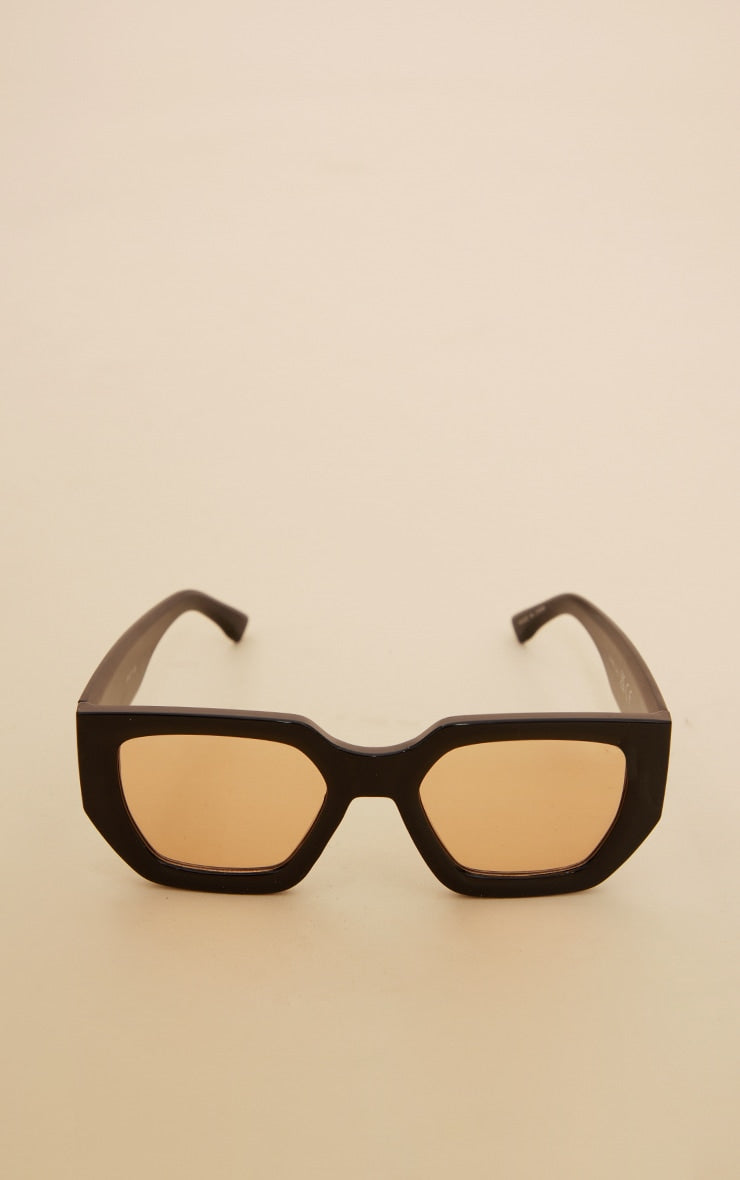 https://cdn-img.prettylittlething.com/b/4/f/6/b4f6a4829c9ccc6d155d6fe712fb57111dd7506f_CNC5002_2_black_chunky_brown_lens_square_frame_sunglasses.jpg