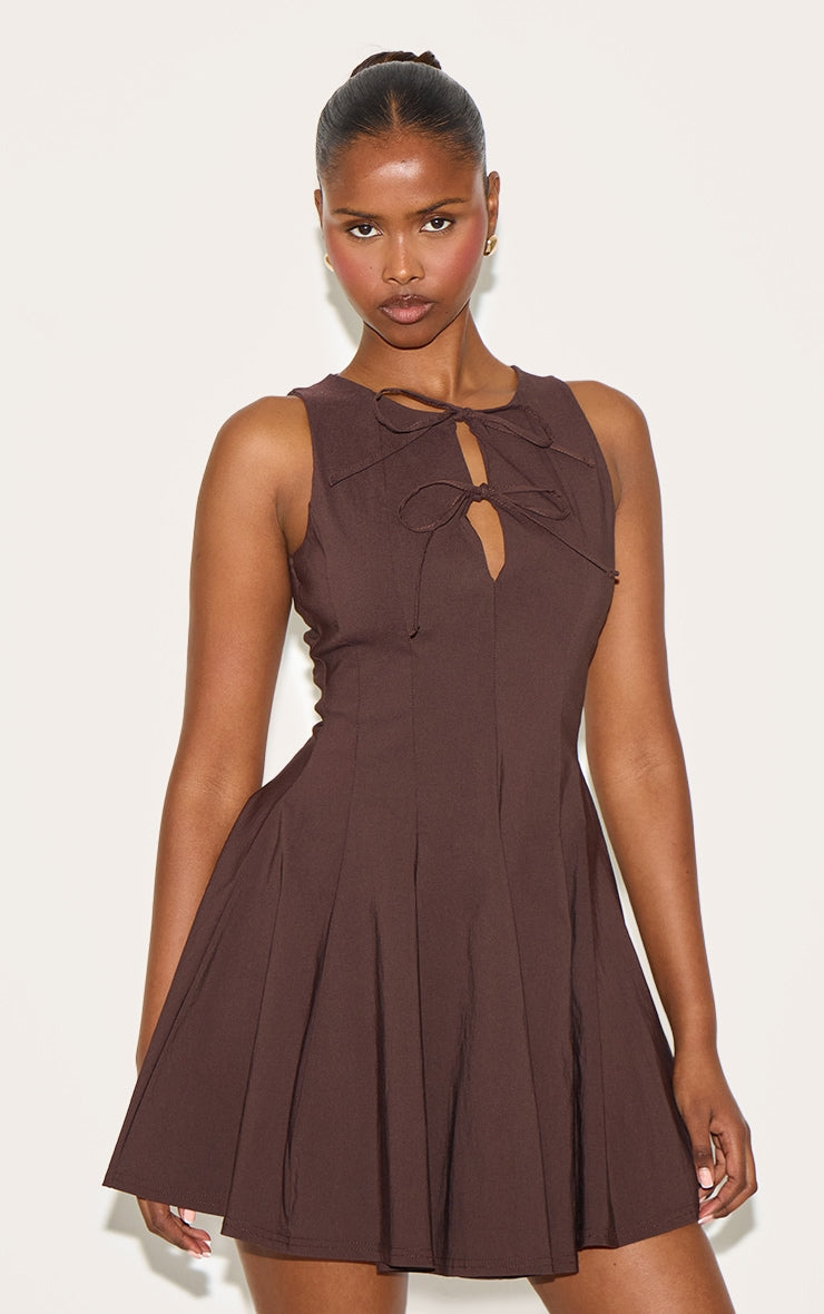 https://cdn-img.prettylittlething.com/b/7/4/d/b74d0764a8afc3f30bbe6a7321cb50050779eb4f_CNM7514_1_chocolate_tie_bow_detail_shift_dress.jpg