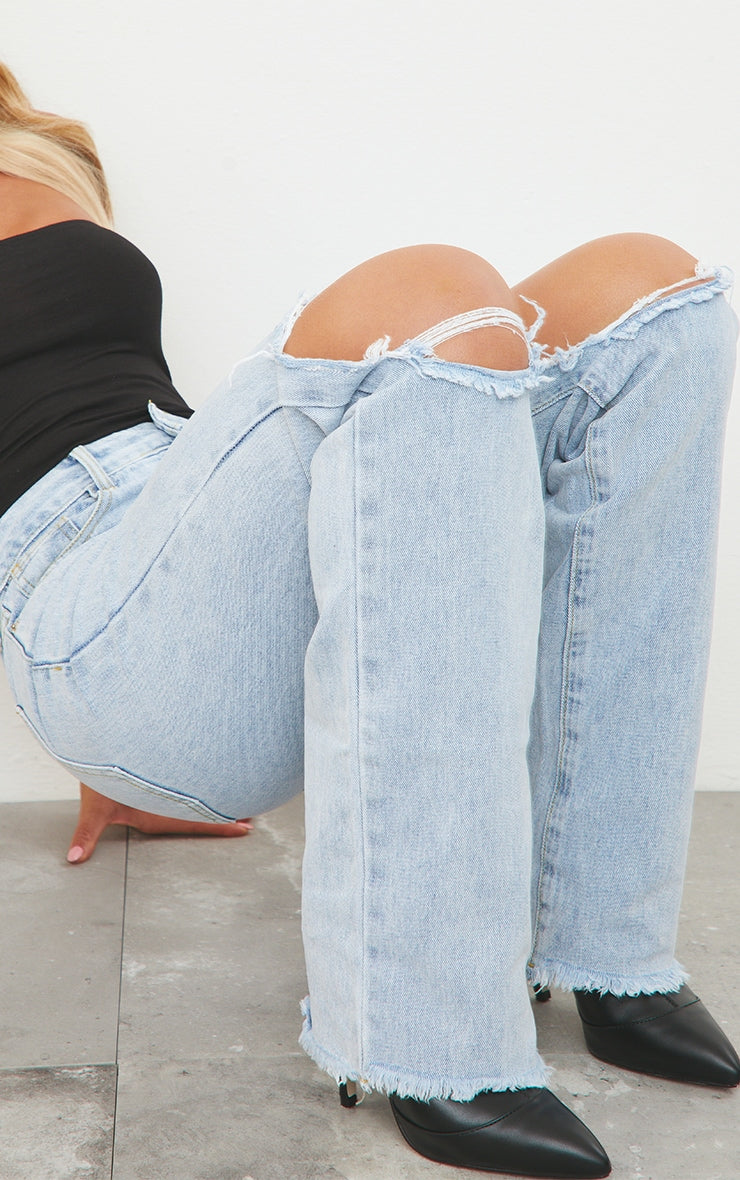 https://cdn-img.prettylittlething.com/e/d/8/5/ed854bfbb19db744e37b572428089dfc8a7b2e4d_CMK1480_4_light_blue_wash_ripped_high_waist_straight_leg_jeans.jpg