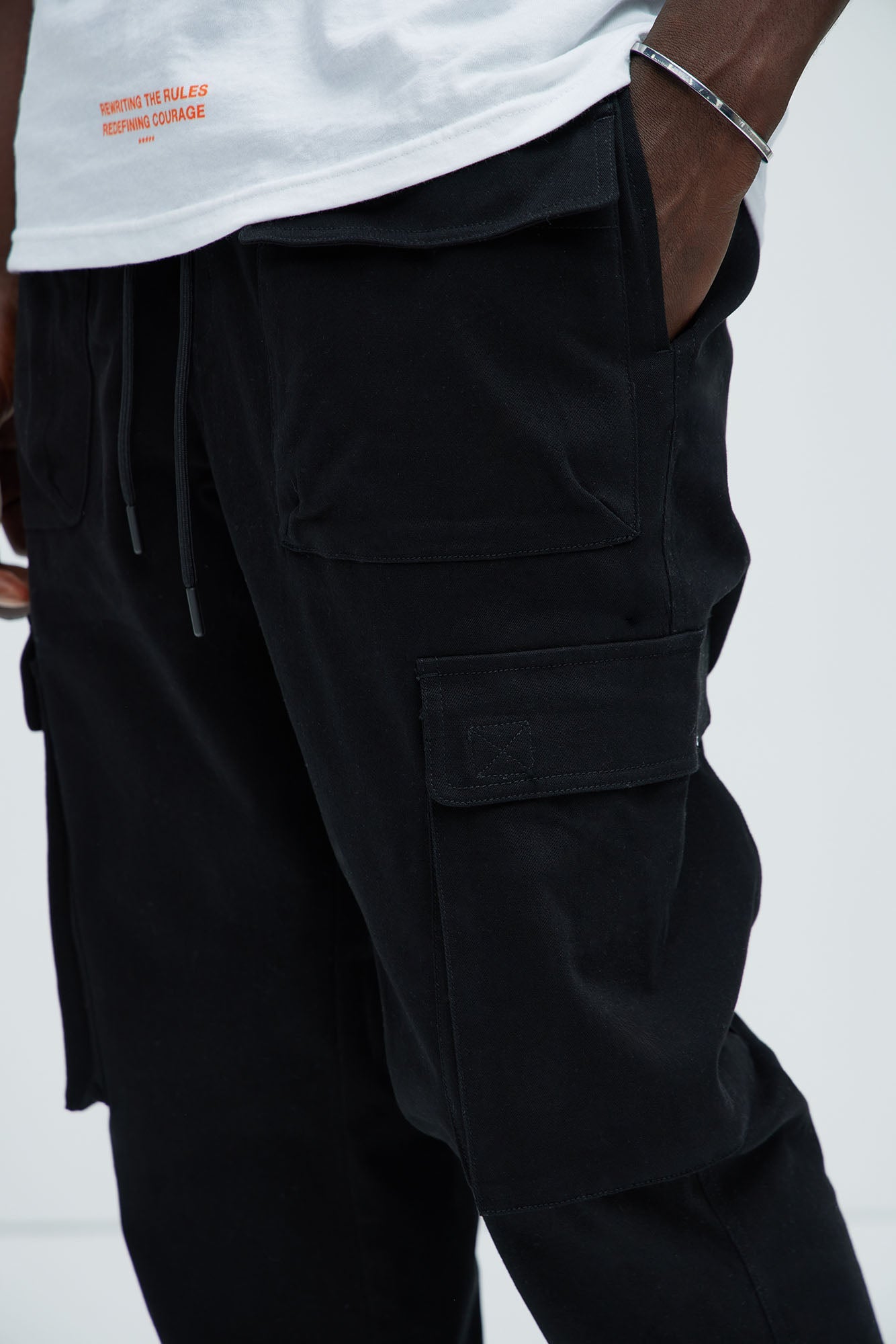 https://cdn.shopify.com/s/files/1/0293/9277/files/06-10-24_S7_62_1PANT008_Black_CZ_DJ_14-02-24_49916_WG.jpg?v=1718297775