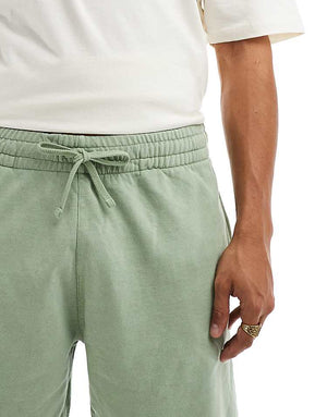 New Era washed jersey shorts in green