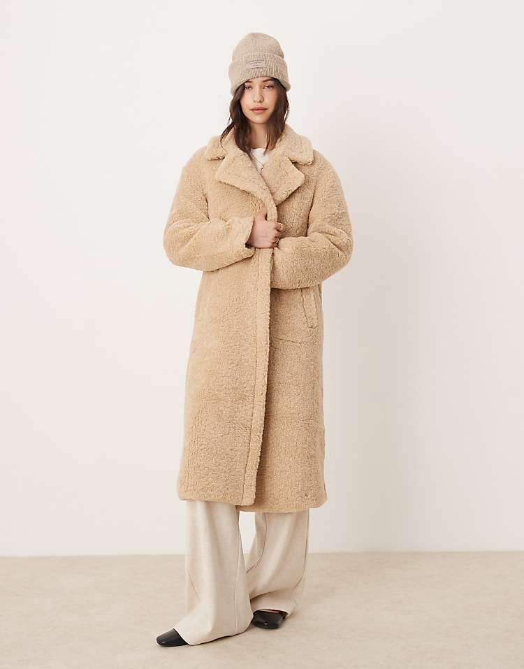 Glamorous beige faux fur long coat