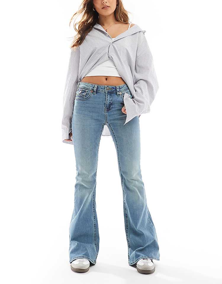 https://images.asos-media.com/products/stradivarius-low-rise-flare-jean-in-mid-blue/207743057-1-blue?$n_750w$&wid=750&fit=constrain