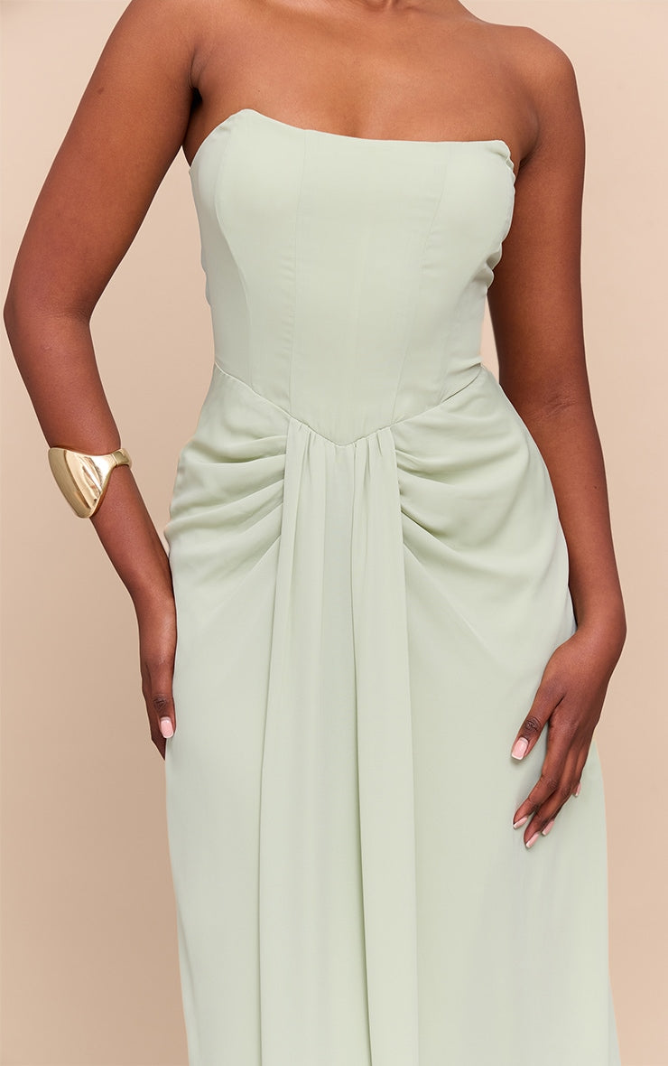 https://cdn-img.prettylittlething.com/4/0/2/e/402ef7e17ac5085f97129257ce485b503458a938_CNM5831_4_sage_green_bandeau_corset_drape_detail_maxi_dress.jpg