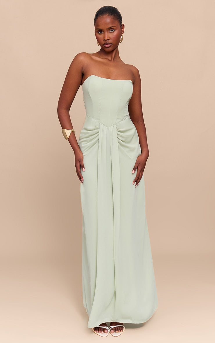 https://cdn-img.prettylittlething.com/5/9/e/9/59e9ab5986051b9a651eac8c7ef123b4a6530fd4_CNM5831_1_sage_green_bandeau_corset_drape_detail_maxi_dress.jpg