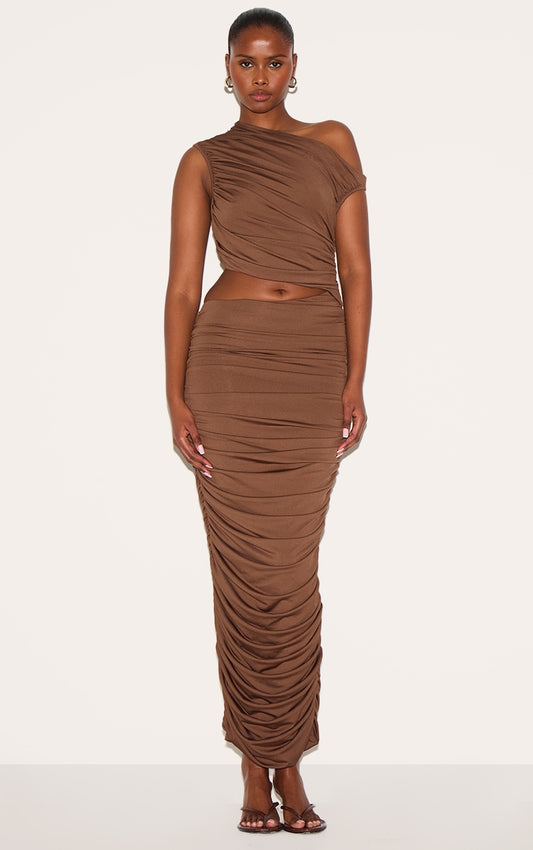 https://cdn-img.prettylittlething.com/7/b/d/1/7bd1a8ba53ed537105e9e0542303e0323980eb35_CNL9989_1_plt_label_chocolate_one_shoulder_ruched_cut_out_maxi_dress.jpg