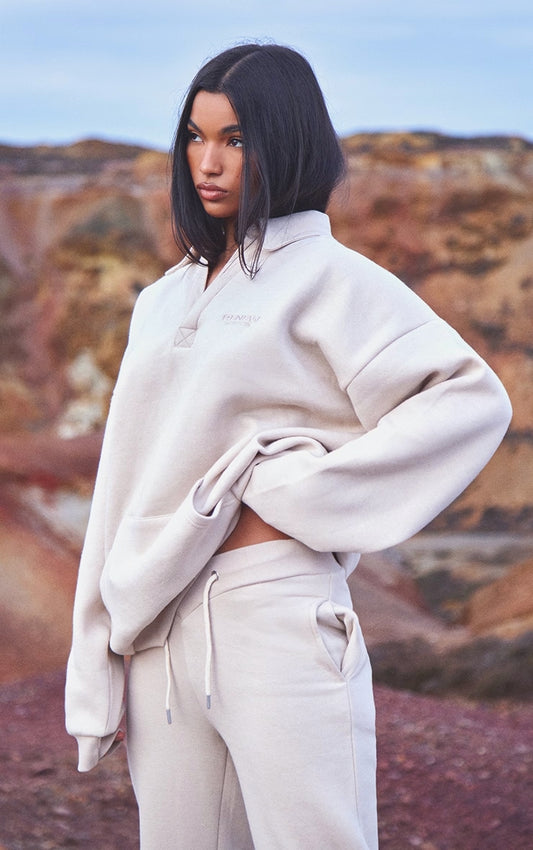 https://cdn-img.prettylittlething.com/b/5/4/6/b5464cdd0a71e95afd26f42ece0f7fc5c0a87f00_CNE5452_1_oatmeal_embroidered_oversized_fit_collar_sweatshirt.jpg