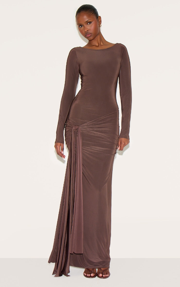 https://cdn-img.prettylittlething.com/f/6/c/3/f6c3cb2cd708639ba18c4b2bfede1ac151f6b401_CNM9070_1_chocolate_double_layer_slinkyy_drop_waist_knot_detail_maxi_dress.jpg